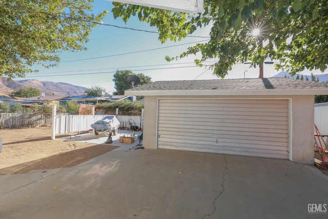 garage featuring a mountain view