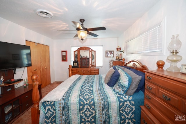 bedroom featuring ceiling fan and carpet floors