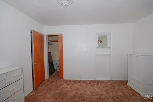 unfurnished bedroom featuring light colored carpet