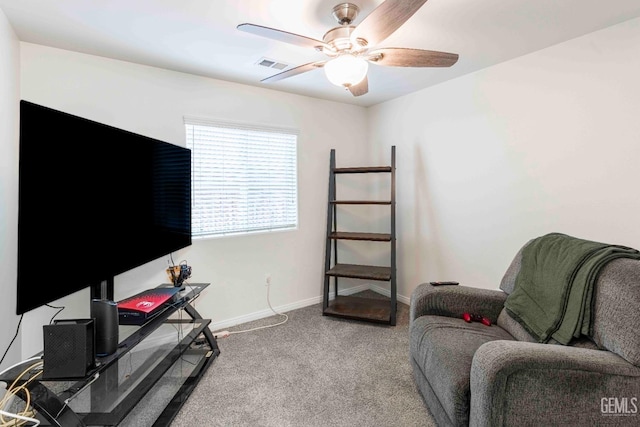 interior space featuring ceiling fan and carpet floors