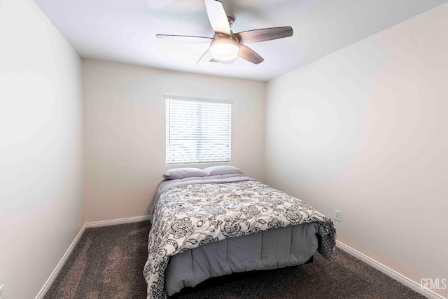 bedroom featuring dark carpet and ceiling fan