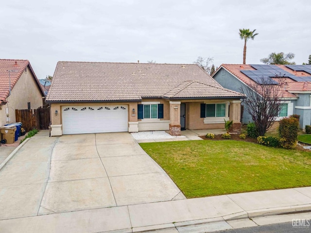 ranch-style home featuring a garage and a front yard