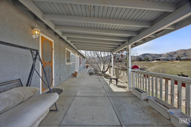 view of patio with a mountain view