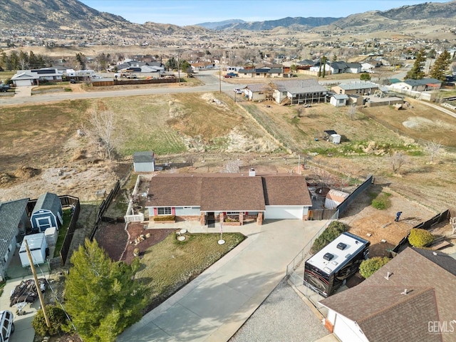 bird's eye view featuring a residential view and a mountain view