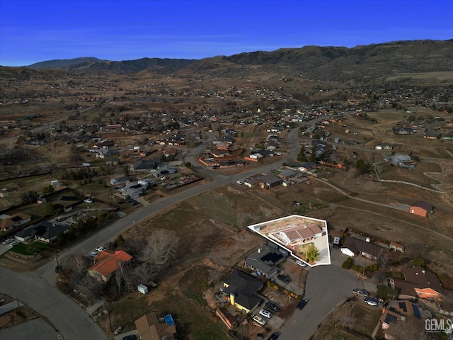 bird's eye view featuring a residential view and a mountain view