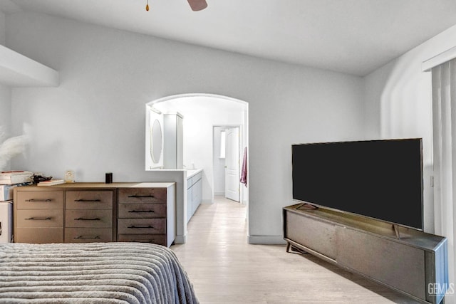 bedroom with ceiling fan and light hardwood / wood-style floors