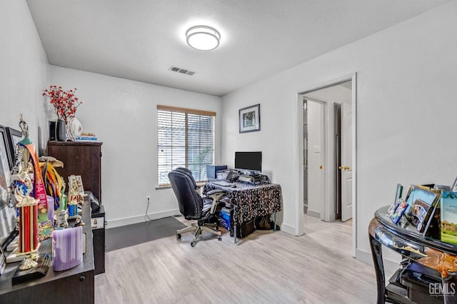 office area featuring hardwood / wood-style floors