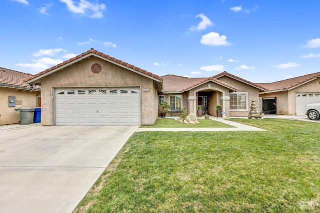 view of front of house featuring a garage and a front lawn