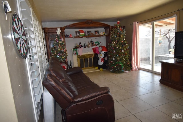 living area featuring light tile patterned flooring