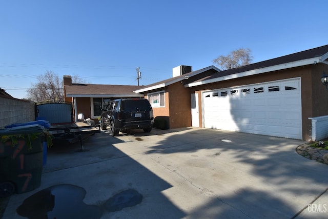 exterior space with a garage