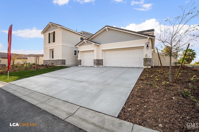 view of front facade featuring stucco siding, stone siding, fence, concrete driveway, and an attached garage