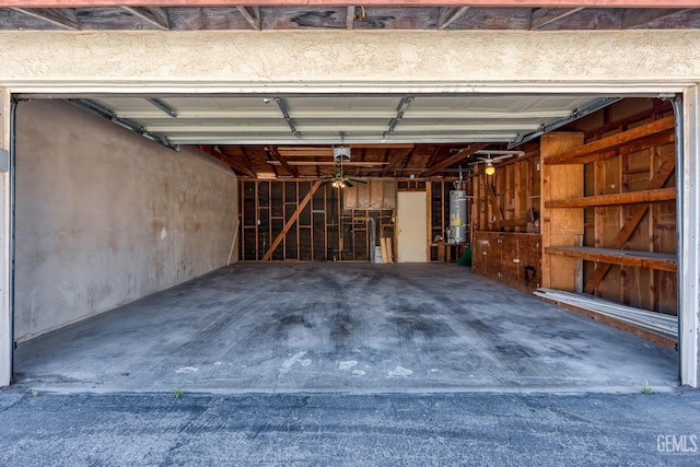 914 4th St, Taft, CA 93268 - garage featuring secured water heater and a garage door opener