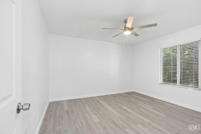 914 4th St, Taft, CA 93268 - empty room featuring wood finished floors, a ceiling fan, and baseboards