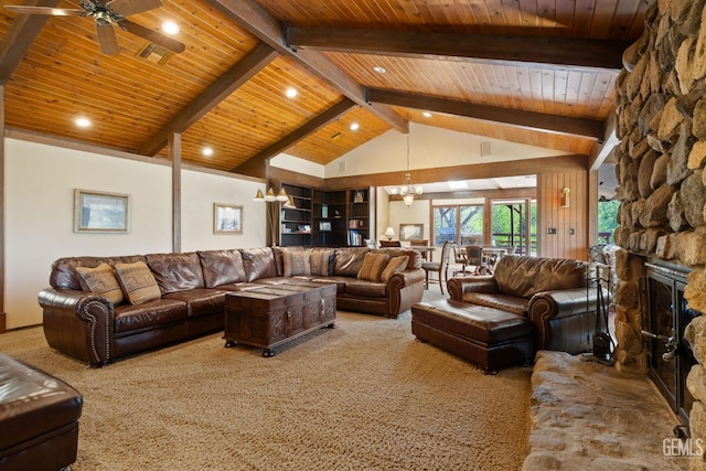 4227 Poso Flat Rd, Bakersfield, CA 93308 - carpeted living room featuring a ceiling fan, a stone fireplace, beam ceiling, wooden ceiling, and recessed lighting