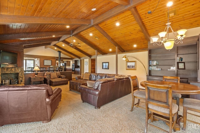 4227 Poso Flat Rd, Bakersfield, CA 93308 - living room with light colored carpet, vaulted ceiling with beams, a stone fireplace, and wooden ceiling
