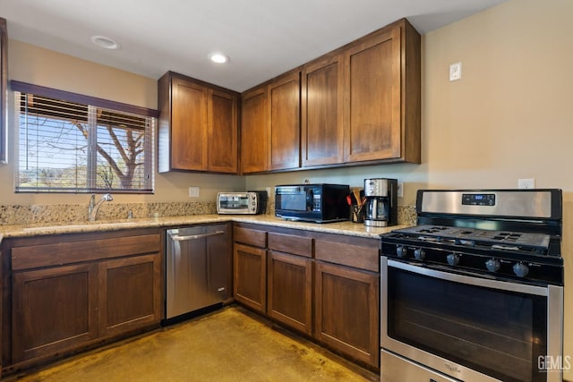 4227 Poso Flat Rd, Bakersfield, CA 93308 - kitchen featuring finished concrete flooring, light stone countertops, a sink, stainless steel appliances, and recessed lighting