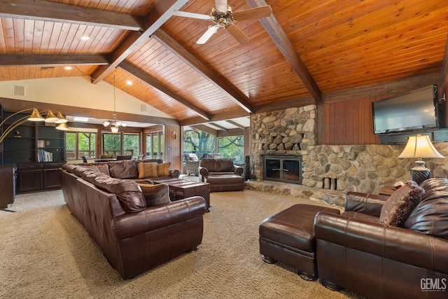 4227 Poso Flat Rd, Bakersfield, CA 93308 - living area with a stone fireplace, a wealth of natural light, light carpet, and wooden ceiling