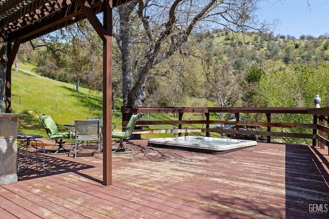 4227 Poso Flat Rd, Bakersfield, CA 93308 - deck with outdoor dining area, a lawn, and a wooded view