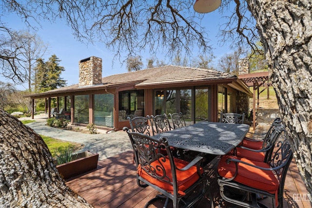 4227 Poso Flat Rd, Bakersfield, CA 93308 - deck with a sunroom and outdoor dining space