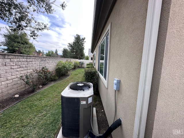 view of yard featuring central AC unit