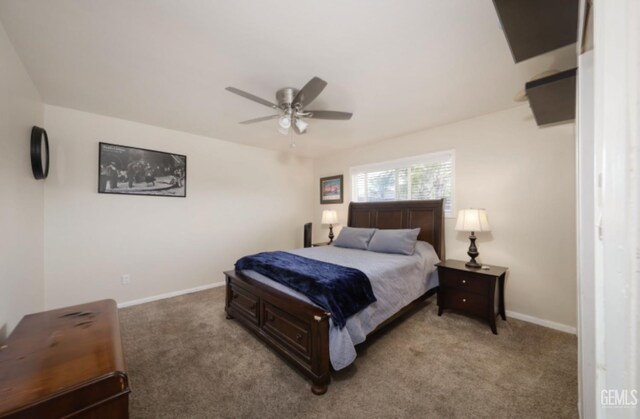 3717 Basin Ave, Bakersfield, CA 93309 - bedroom featuring light colored carpet, baseboards, and ceiling fan
