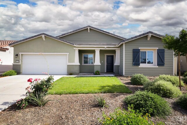 10213 Breitenbush Ave, Bakersfield, CA 93311 - view of front facade with driveway, a garage, a front lawn, covered porch, and a tile roof