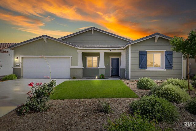 10213 Breitenbush Ave, Bakersfield, CA 93311 - view of front of house with driveway, a garage, and a lawn