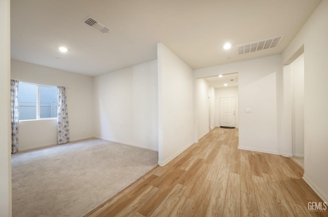 10213 Breitenbush Ave, Bakersfield, CA 93311 - unfurnished room featuring light wood-style flooring, recessed lighting, and baseboards