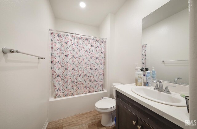 10213 Breitenbush Ave, Bakersfield, CA 93311 - full bath featuring wood finished floors, vanity, toilet, and shower / tub combo