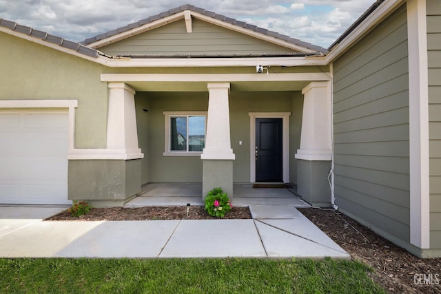 10213 Breitenbush Ave, Bakersfield, CA 93311 - view of exterior entry with a porch and stucco siding