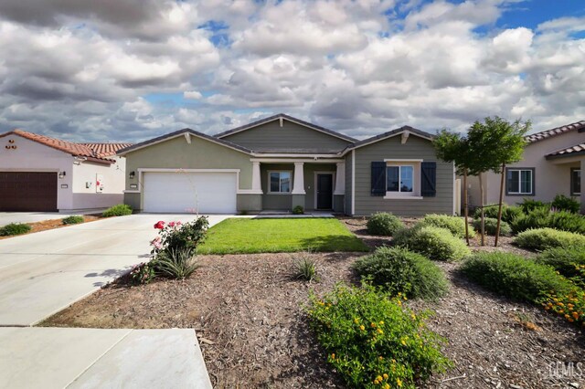 10213 Breitenbush Ave, Bakersfield, CA 93311 - view of front facade featuring concrete driveway, an attached garage, a front yard, and stucco siding