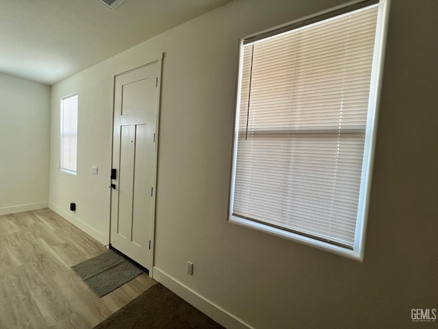 entrance foyer with light hardwood / wood-style floors