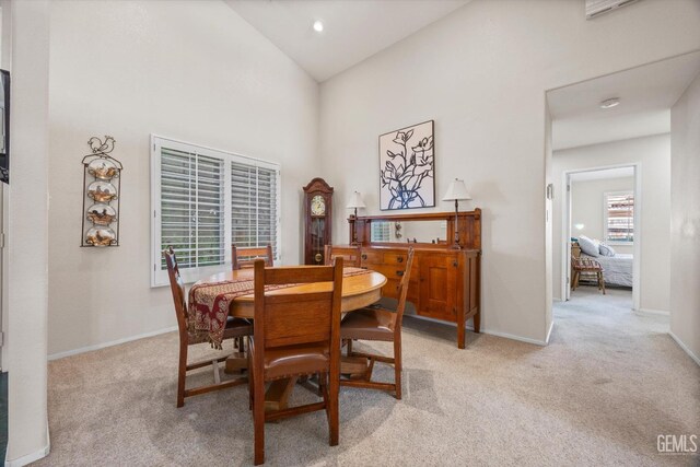 9000 Willamette Ct, Bakersfield, CA 93312 - dining area featuring light carpet and high vaulted ceiling