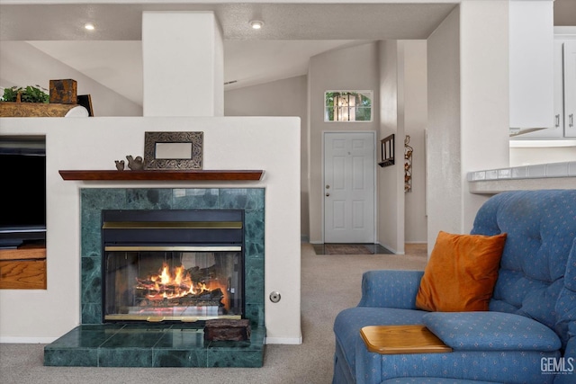 9000 Willamette Ct, Bakersfield, CA 93312 - living room with vaulted ceiling, carpet floors, and a fireplace