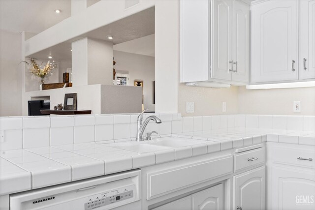 9000 Willamette Ct, Bakersfield, CA 93312 - kitchen with white cabinets, dishwasher, tile countertops, and recessed lighting