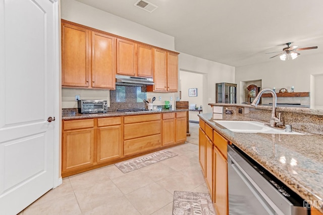 kitchen with ceiling fan, visible vents, appliances with stainless steel finishes, a sink, and under cabinet range hood