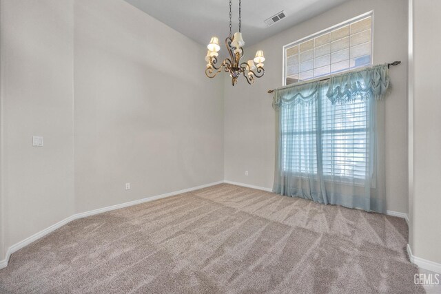 10611 Fishers Peak Dr, Bakersfield, CA 93312 - carpeted spare room featuring a chandelier and plenty of natural light