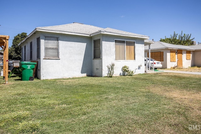 exterior space with a yard