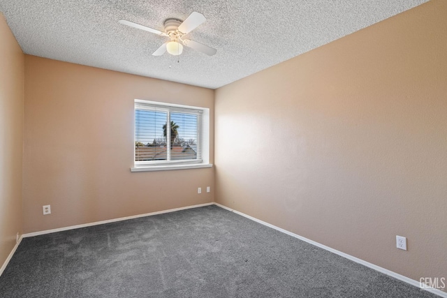 carpeted empty room featuring a textured ceiling and ceiling fan