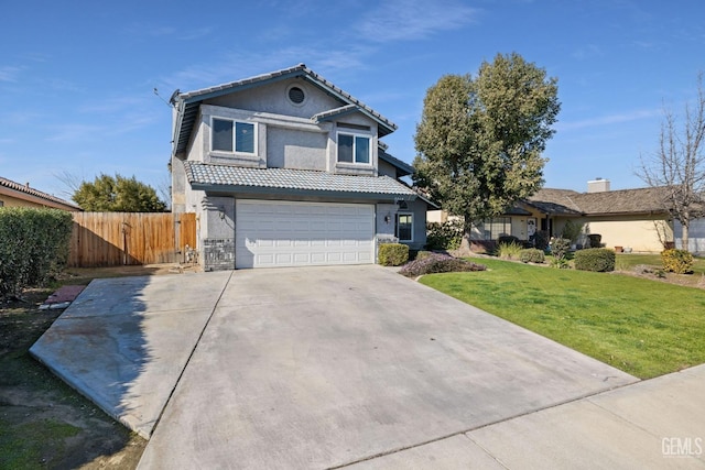 front of property featuring a garage and a front yard