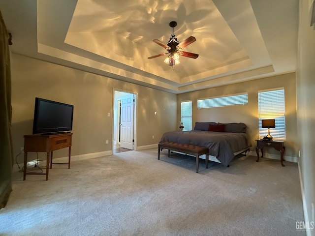 15725 Marty Ave, Bakersfield, CA 93314 - bedroom featuring a raised ceiling, light carpet, and multiple windows