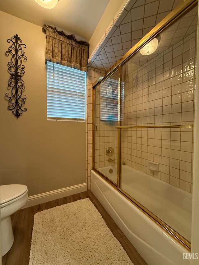 15725 Marty Ave, Bakersfield, CA 93314 - full bathroom with wood finished floors and combined bath / shower with glass door