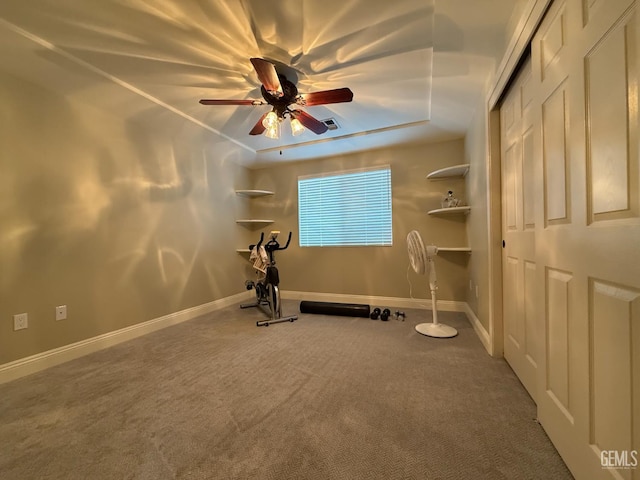 15725 Marty Ave, Bakersfield, CA 93314 - workout room with ceiling fan, carpet floors, and a raised ceiling