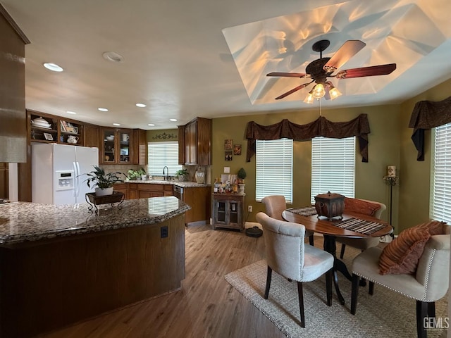 15725 Marty Ave, Bakersfield, CA 93314 - dining space with light wood finished floors, a ceiling fan, and recessed lighting