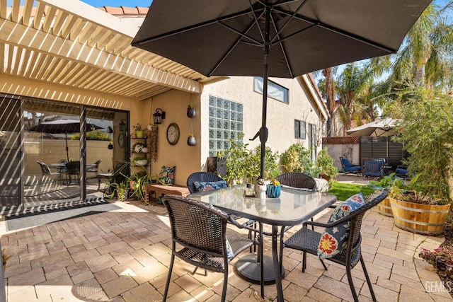 view of patio featuring a pergola