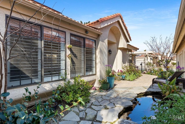 view of home's exterior featuring a patio