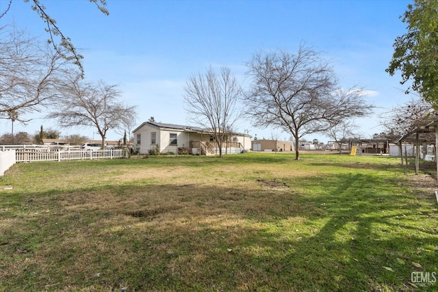 view of yard featuring fence