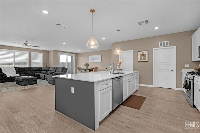 kitchen featuring a sink, visible vents, and appliances with stainless steel finishes