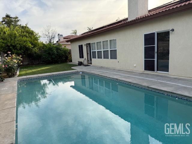 11615 Marazion Hill Ct, Bakersfield, CA 93311 - view of pool featuring a patio area and fence