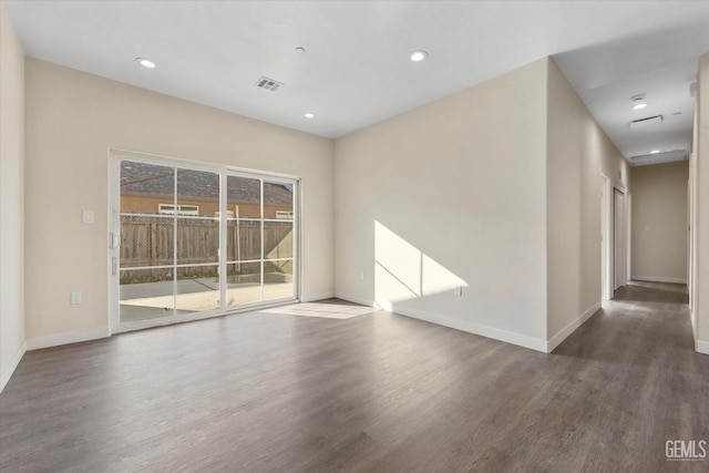 3409 Lotus Ln, Bakersfield, CA 93307 - empty room featuring wood finished floors and recessed lighting